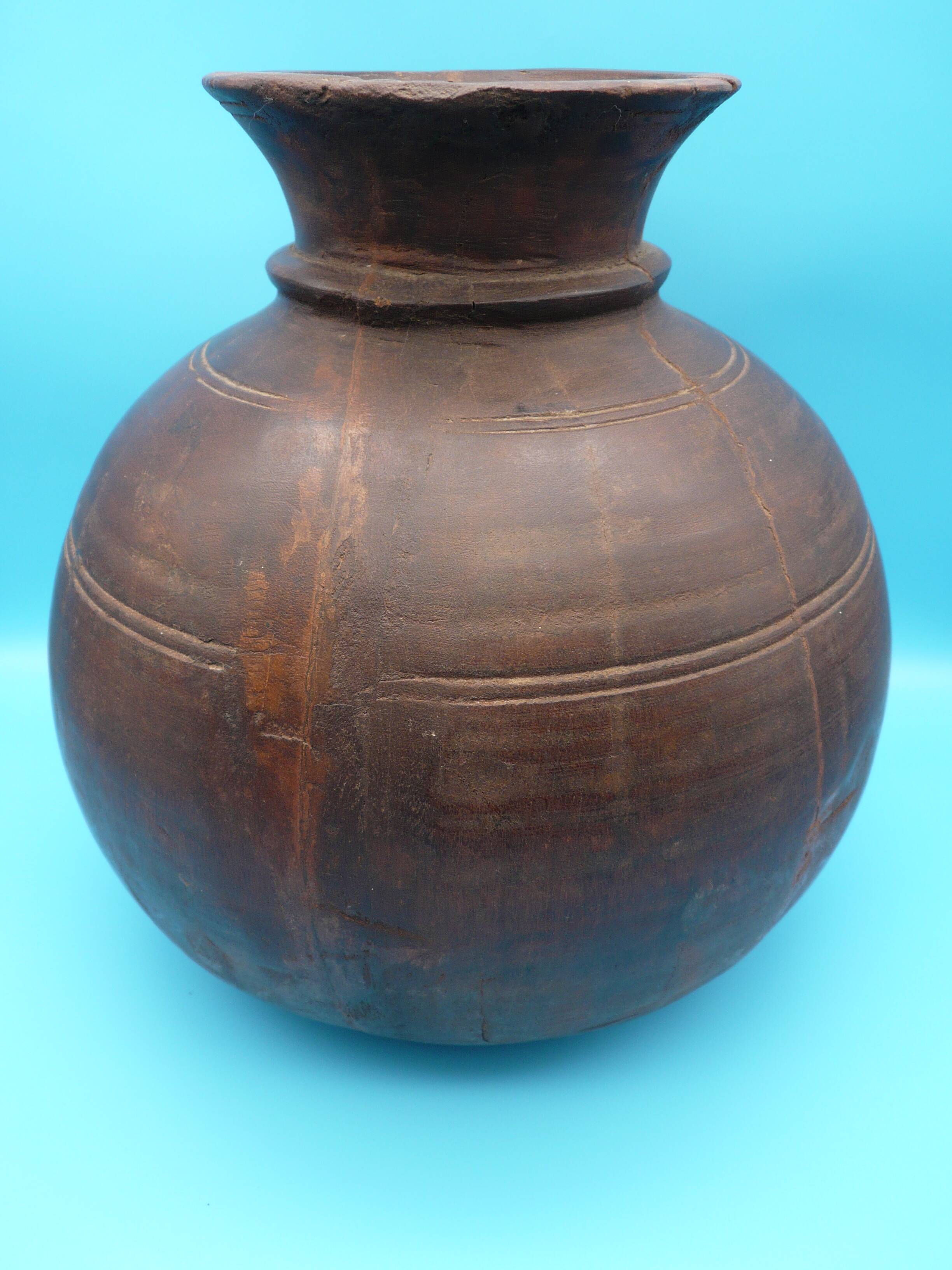 Large carved wooden pot / India