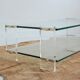 Vintage 1970s double-tier glass and plexiglass coffee table.