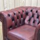 Chesterfield armchair in red leather from the 1980s
