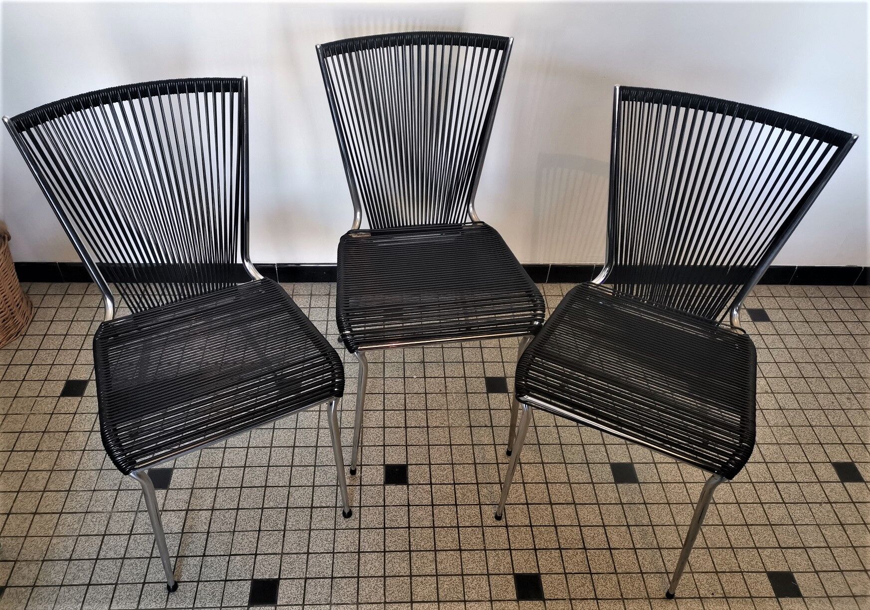 Set of black scoubidou chairs