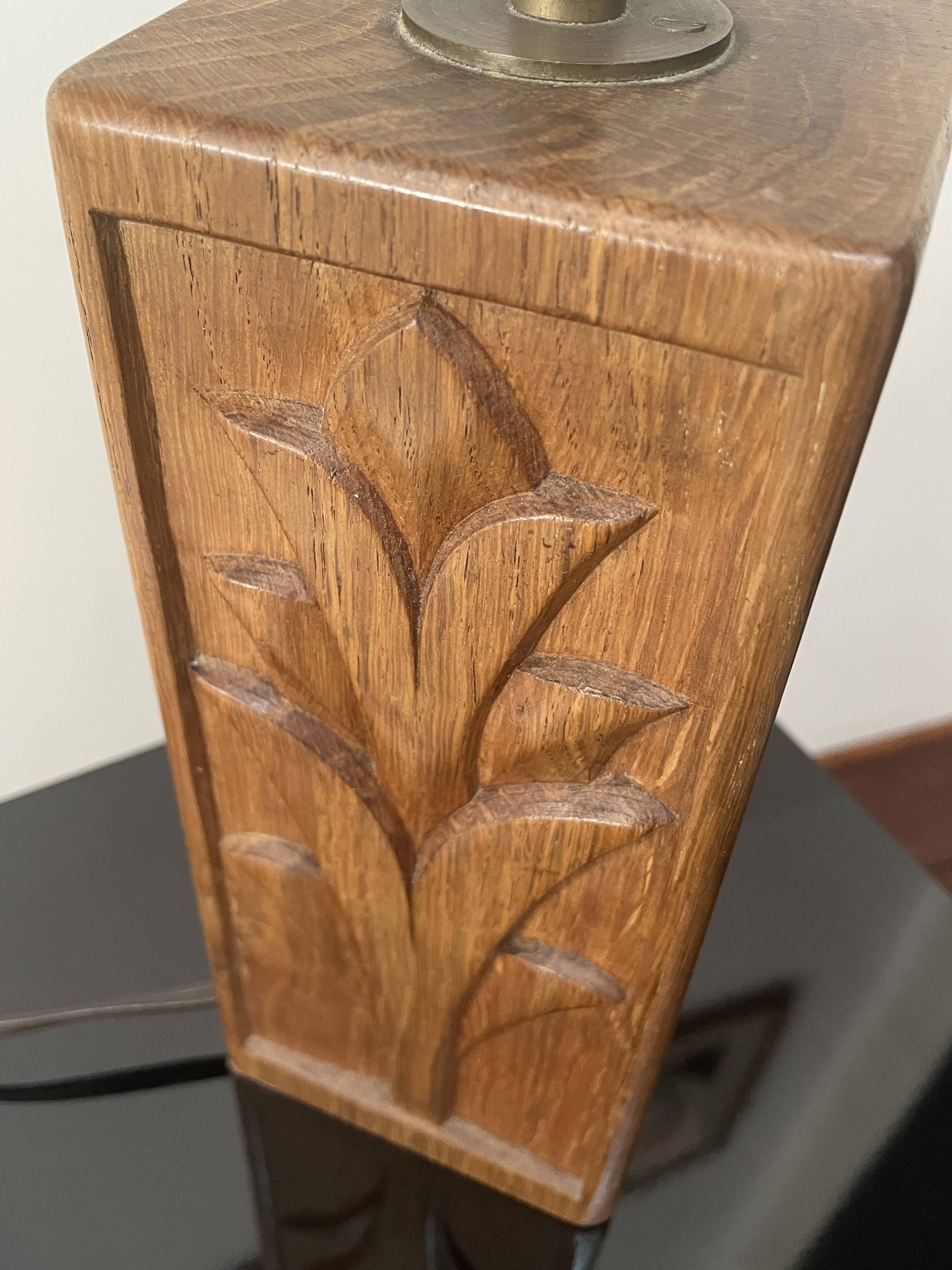 Wooden lamp with carved plant decoration from 1930-50, sold with a 1970 lampshade.