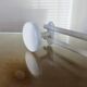 White lacquered metal wall coat rack with 3 hooks, 1980