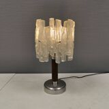 Table lamp with a teak ‘trunk’, silver-coloured metal base, acrylic shade