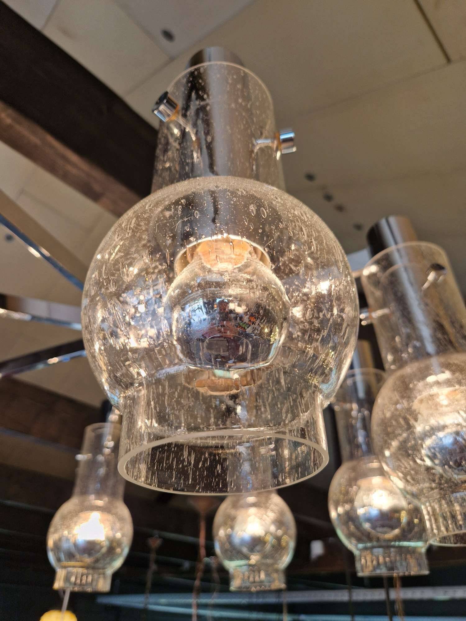 Large ceiling light/chandelier in chromed metal and bubbled blown glass, 1970s