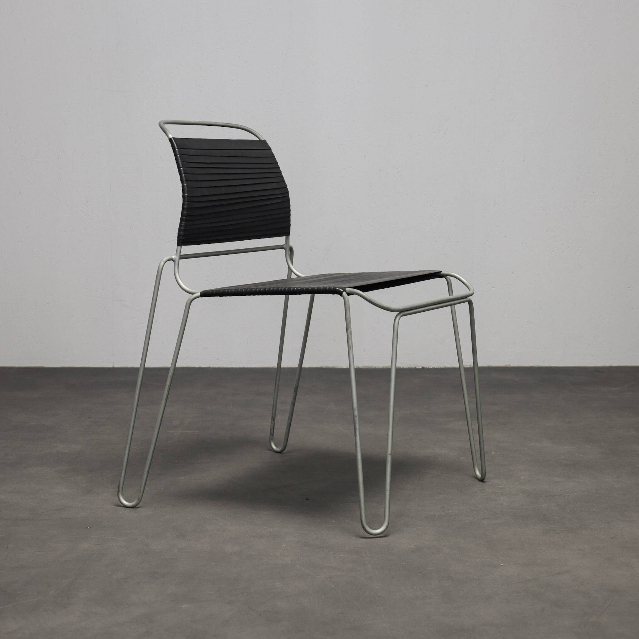 Rare pair of “Rubber Band” chairs by Tom Dixon