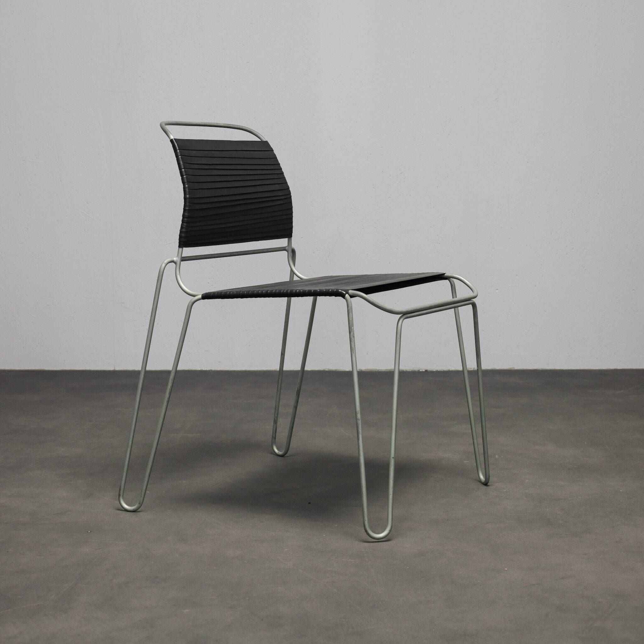 Rare pair of “Rubber Band” chairs by Tom Dixon