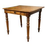 Pine and blonde mahogany desk from the early 20th century.