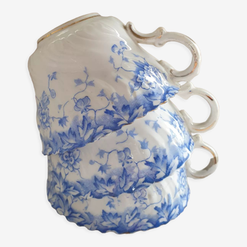 Trio of fine porcelain cups