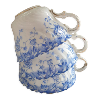 Trio of fine porcelain cups