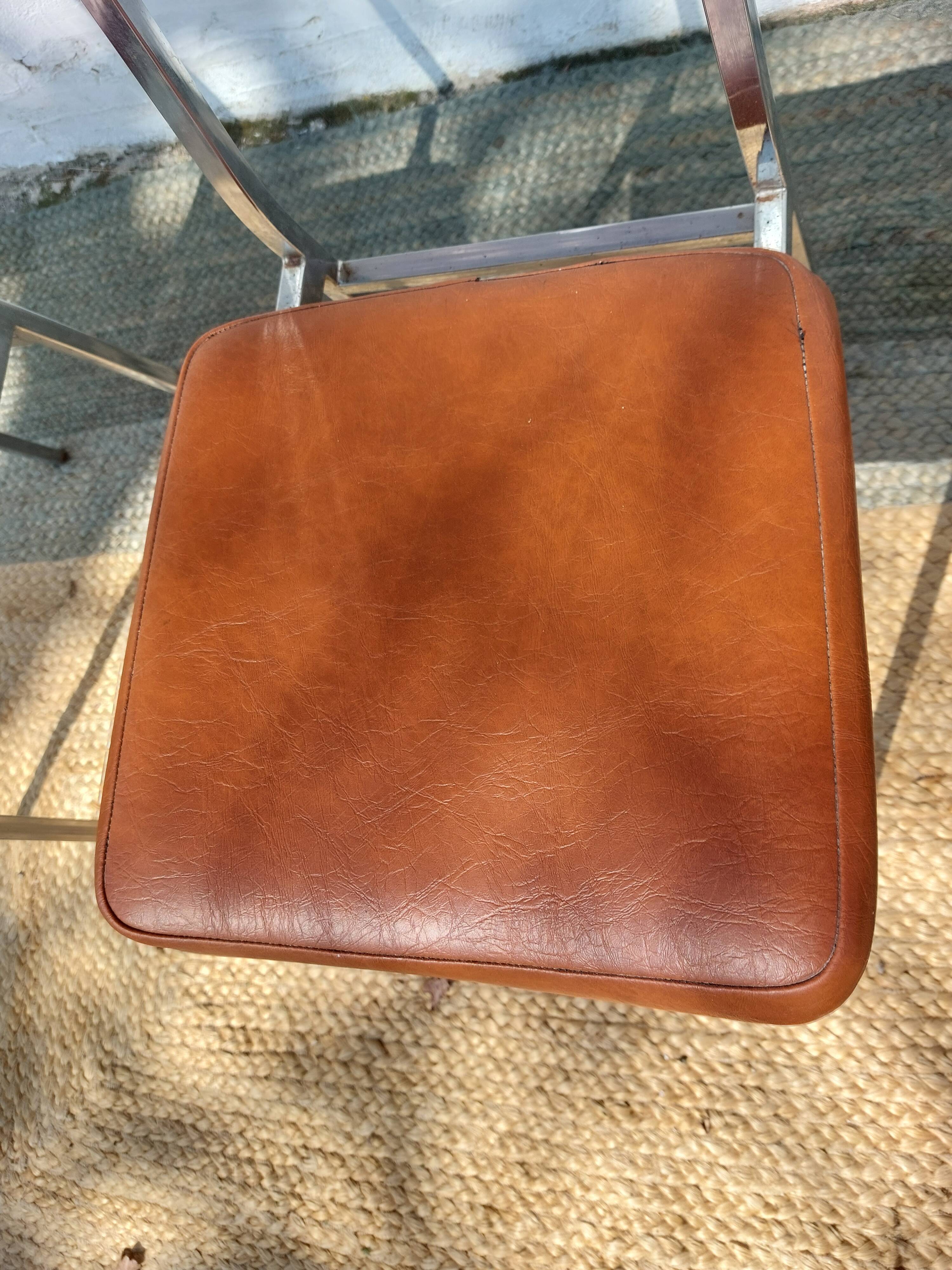 3 stainless steel tube chairs and faux leather, vintage