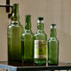 Lot de 4 bouteilles anciennes "L'Hermitage" eau d'arquebuse de Saint Genis Laval (Dept 69)
