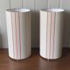 Pair of striped fabric bedside lamps.