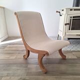 Vintage gondola armchair in beige linen fabric.