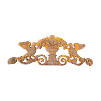 Cast iron pediment with birds