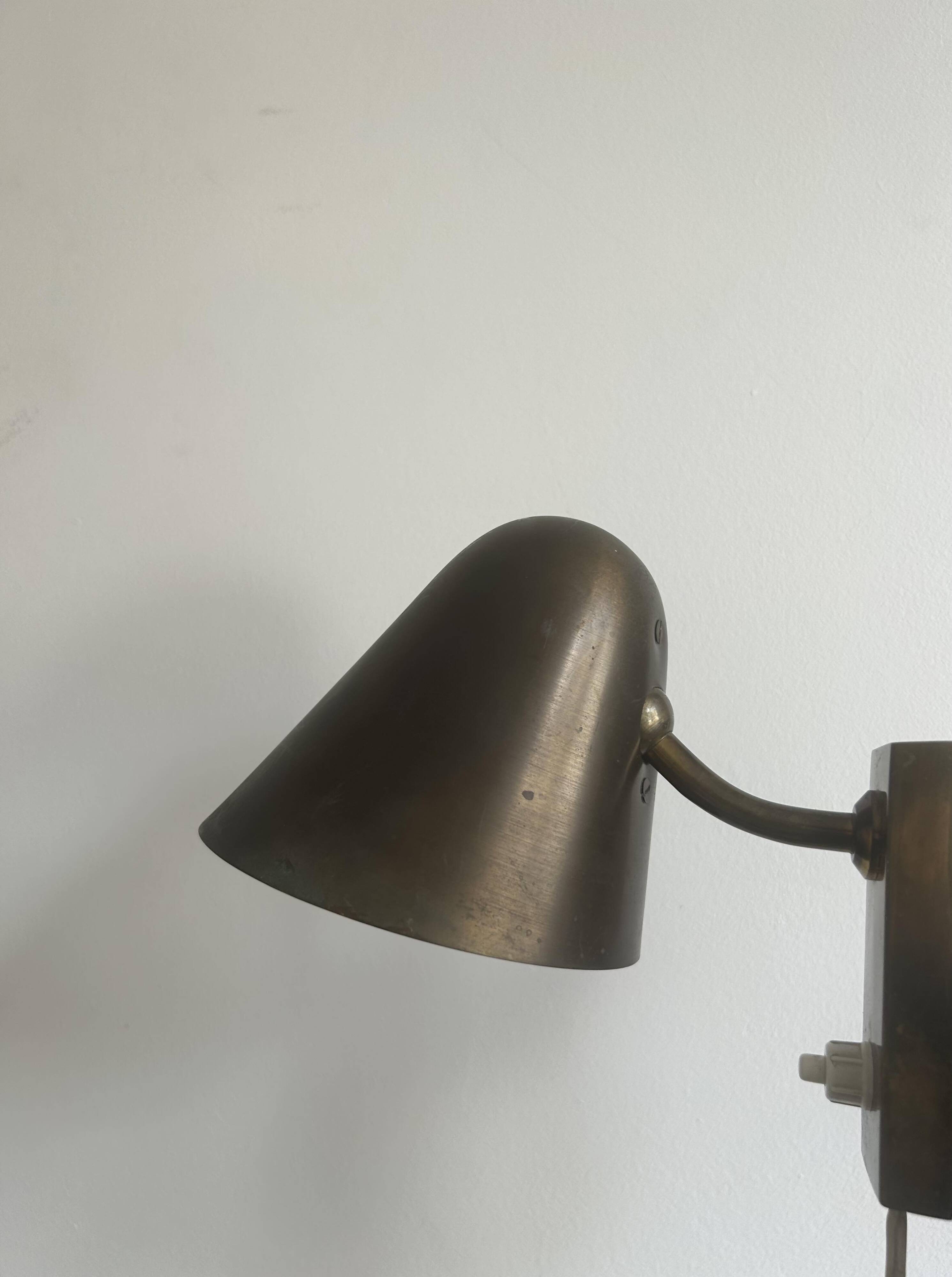 Pair of vintage adjustable wall lights, solid brass, France 1940