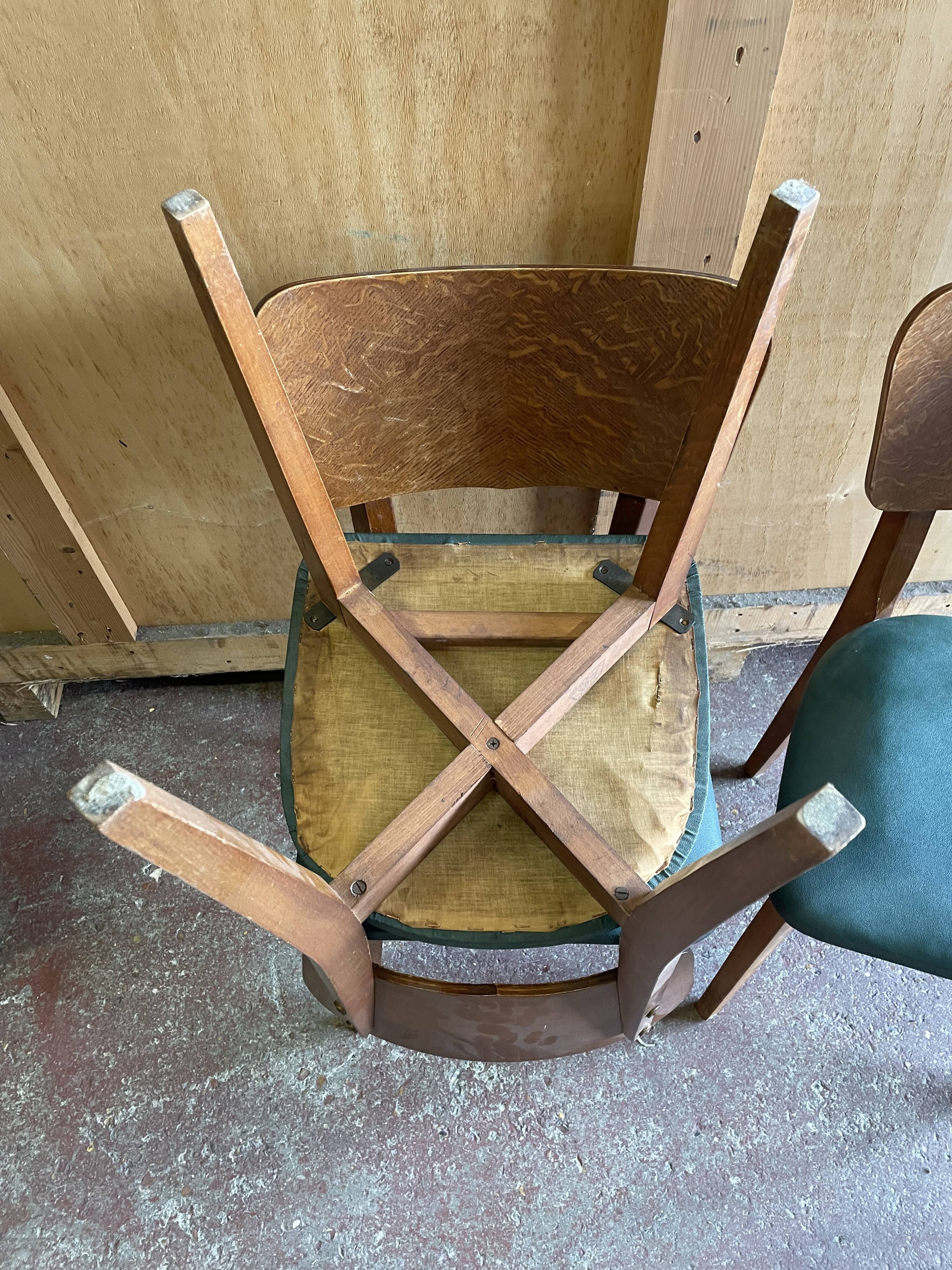 Ensemble de 4 chaises estampillées elf