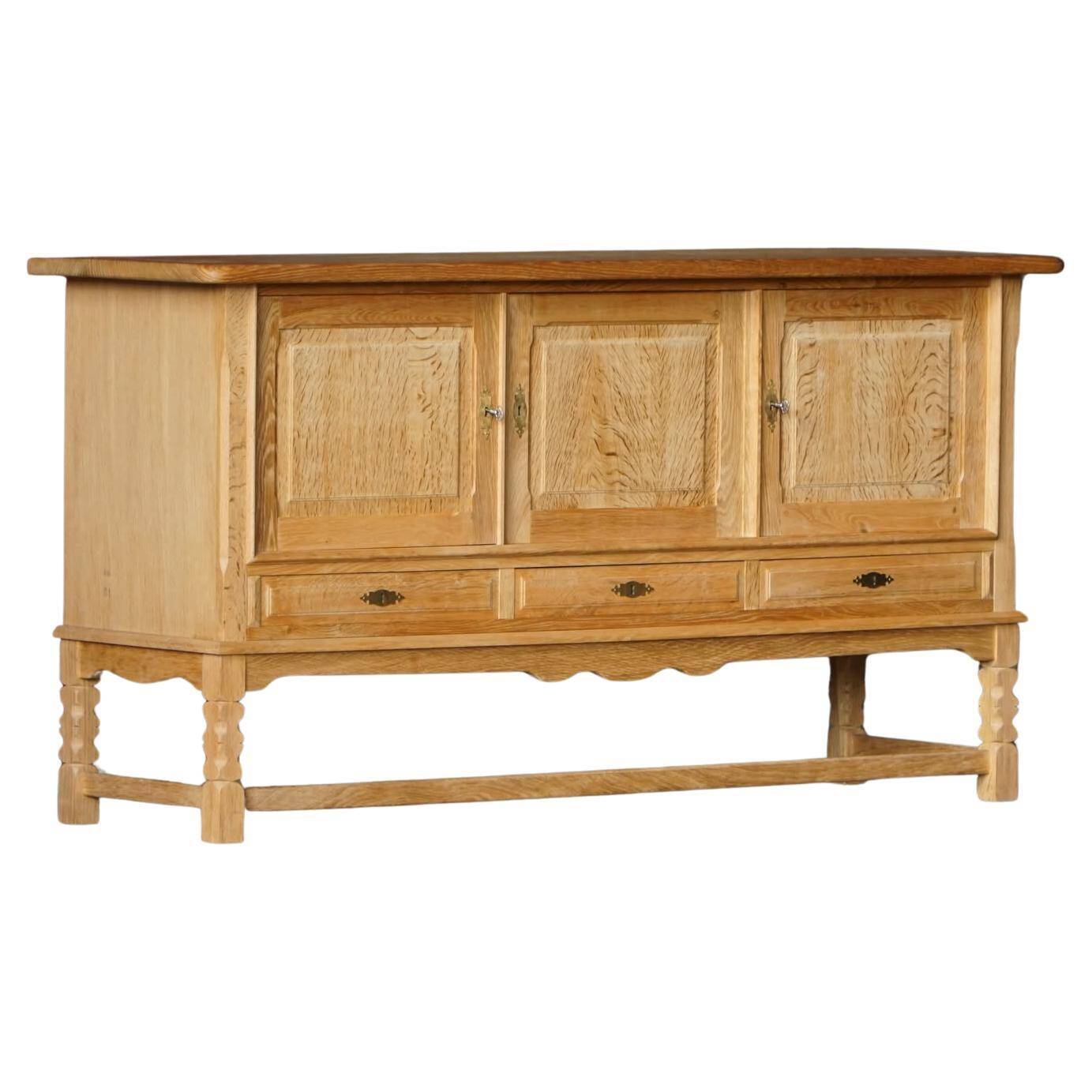 Brutalist Danish enfilade from the mid-century in oak by Henning Kjærnulf, 1960s.