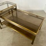 Coffee table in brass and smoked glass designed by Guy Lefèvre for the Jansen house, 1970s/80s