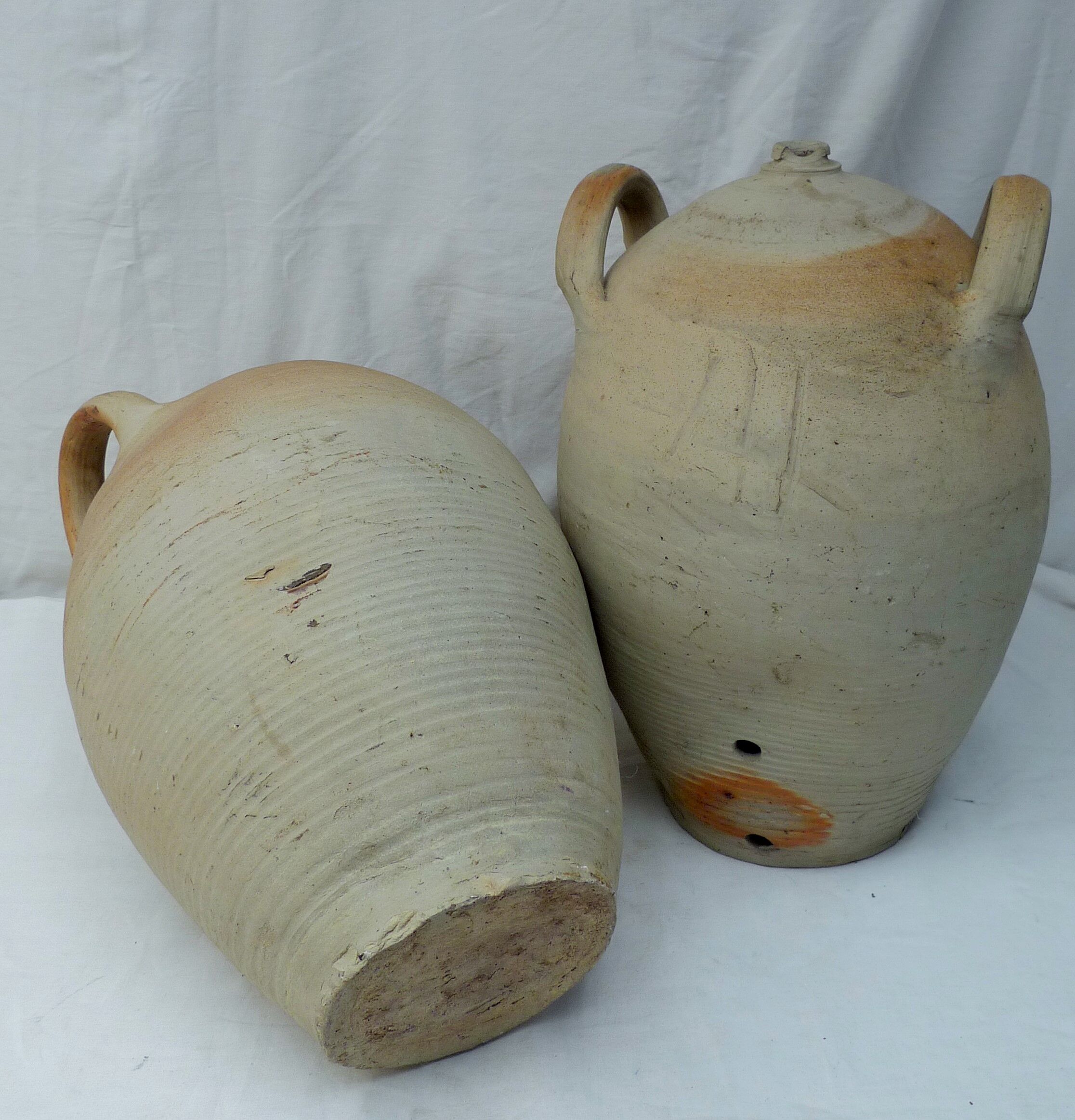 Pair of sandstone oil jars