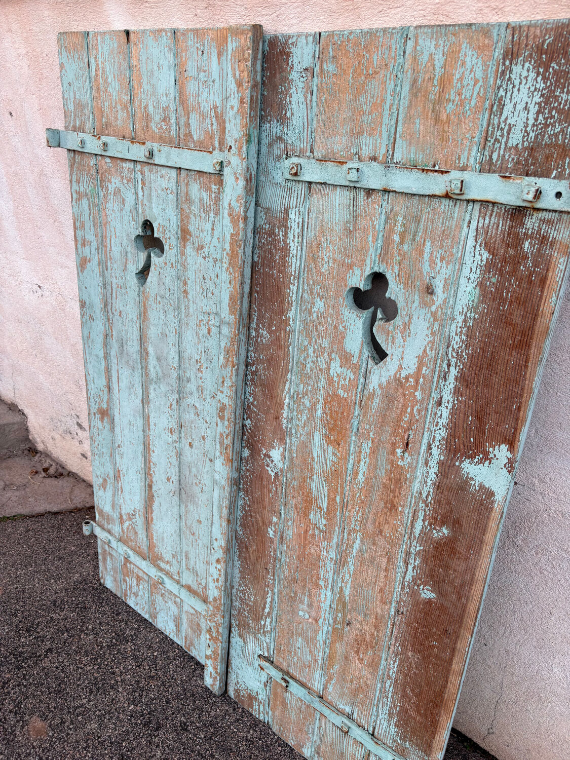 Pair of green wooden shutters