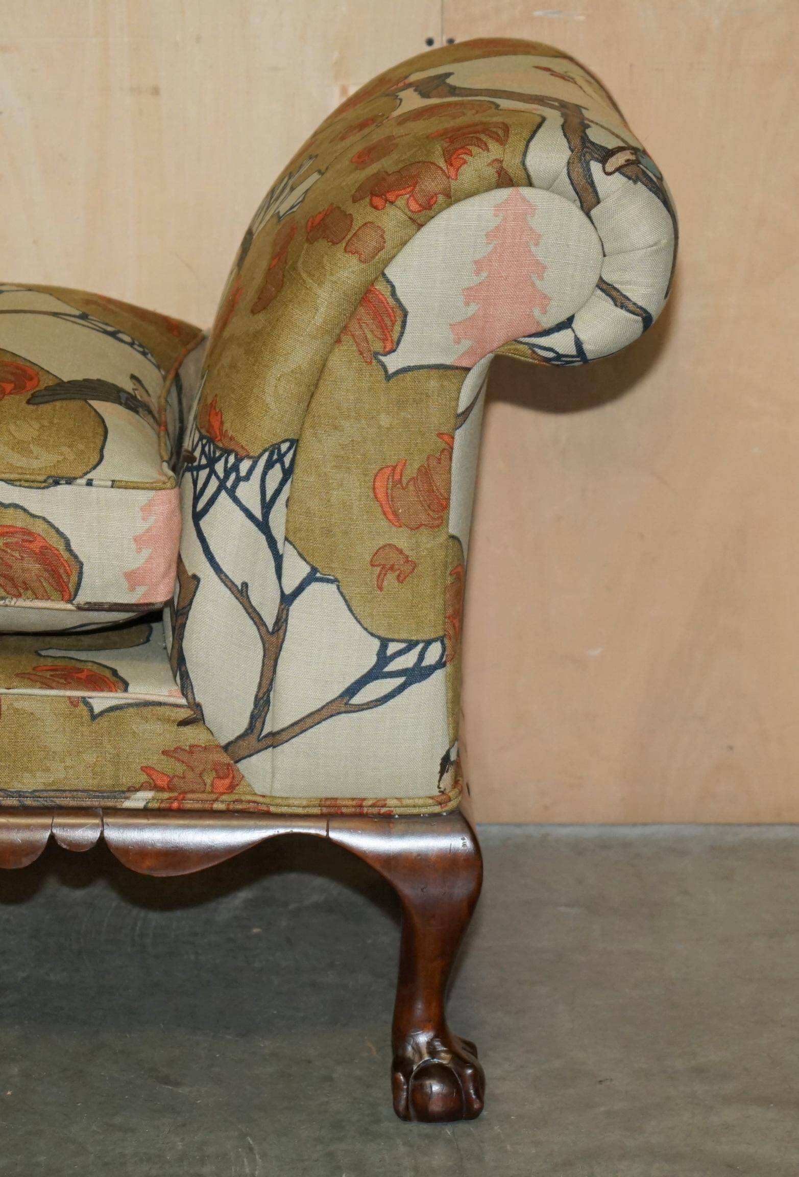 Antique banquette with cluster and ball feet, window seat in Mulberry Flying Ducks fabric.