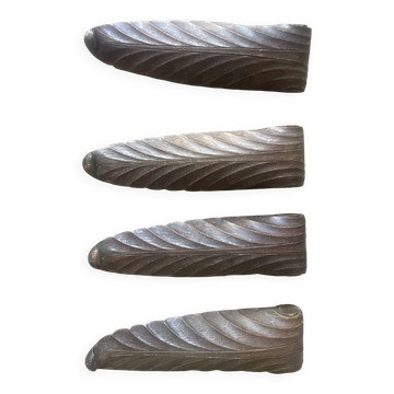 four decorative carved wooden objects