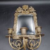 Repousse brass wall mirror with three candles, beveled glass, end of 19th century, double eagles