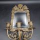 Repousse brass wall mirror with three candles, beveled glass, end of 19th century, double eagles