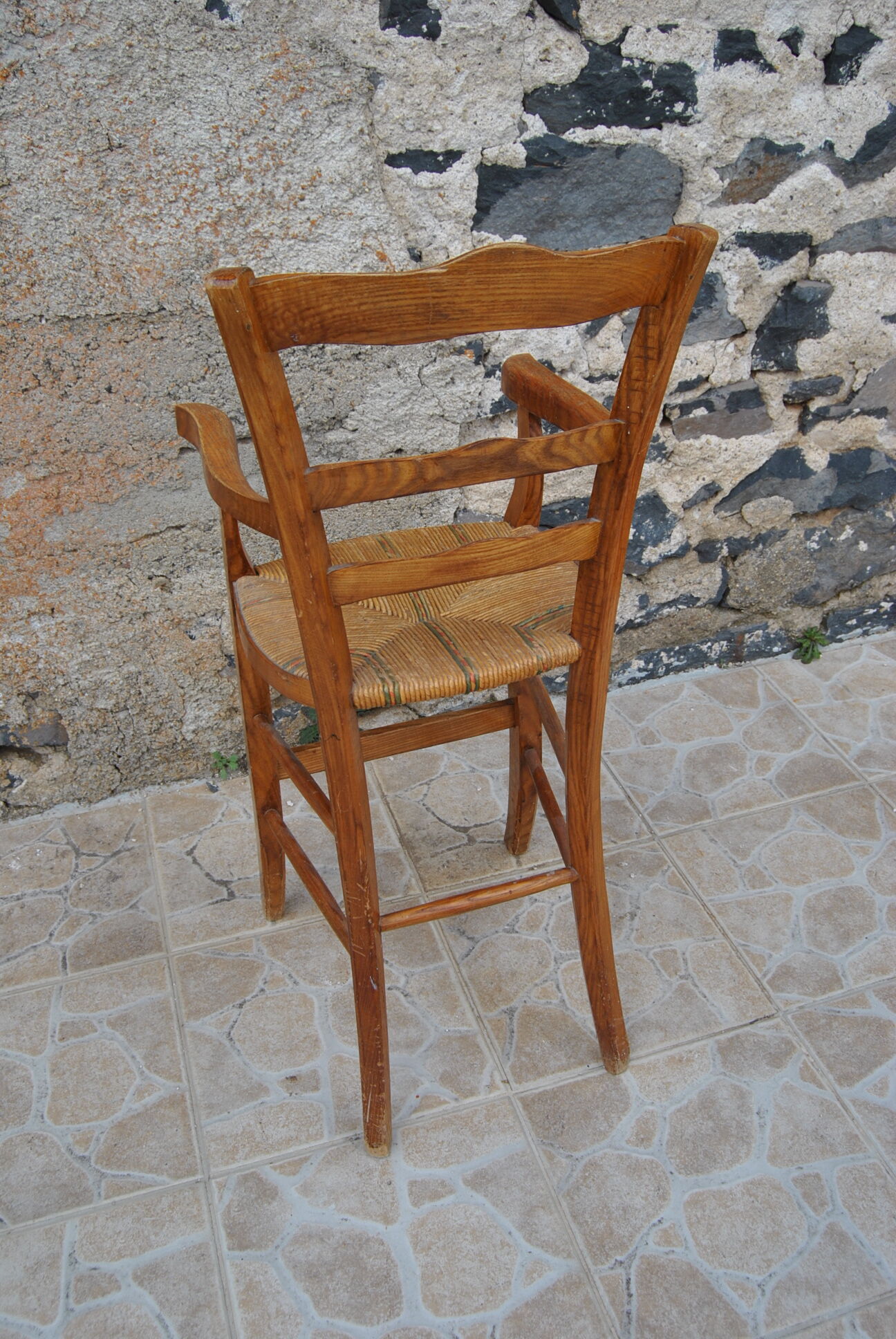 Wooden children's high chair and mulched seat