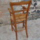 Wooden children's high chair and mulched seat