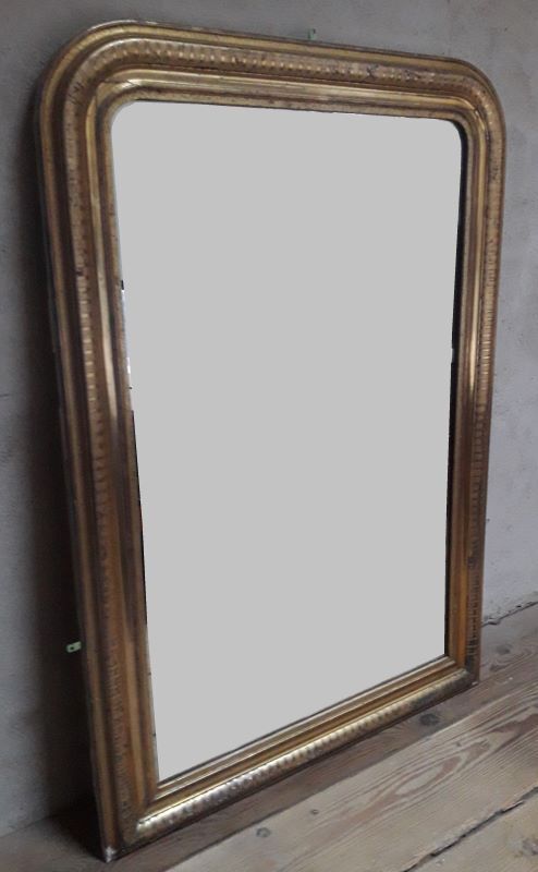 Golden Louis Philippe mirror H122xW84cm with gilded motifs.