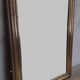 Golden Louis Philippe mirror H122xW84cm with gilded motifs.