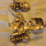 Wall light with lights and lion heads
