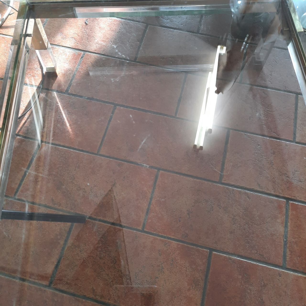 Coffee table with sliding shelf in lucite, brass and glass, Hollywood Regency