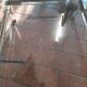 Coffee table with sliding shelf in lucite, brass and glass, Hollywood Regency