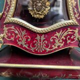 Boudoir clock on Louis XIV style console.
