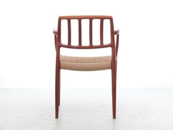 Suite de 4 fauteuils scandinaves en teck modèle 66