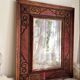 Antique mirror designed by "Pierre Lottier". Leather and nails. France 1