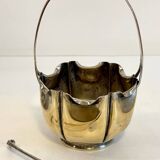 silver metal sugar bowl with gold patina
