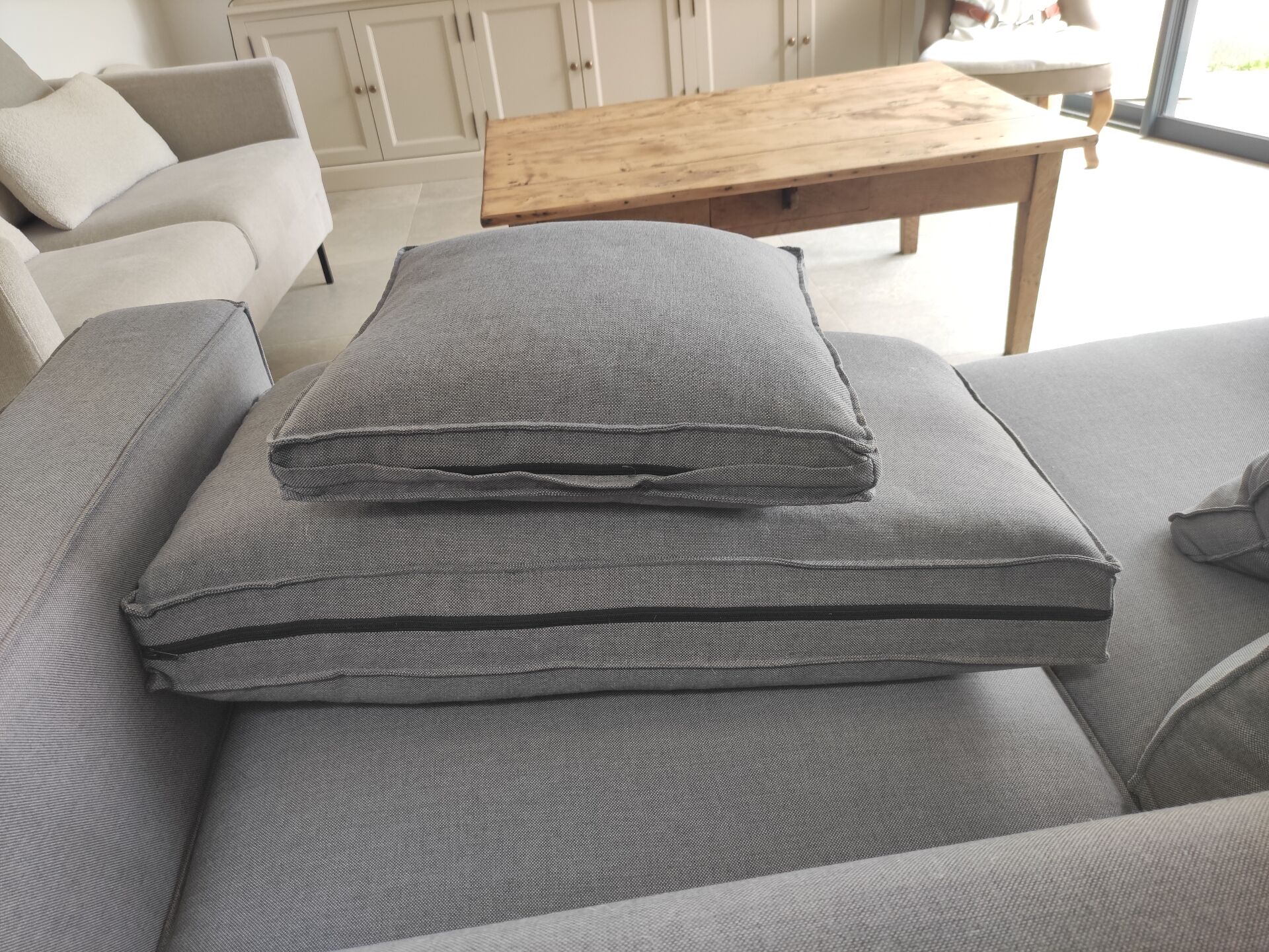 Three-seater grey mottled fabric sofa