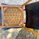 Two vintage Scandinavian chairs in beech and black leatherette