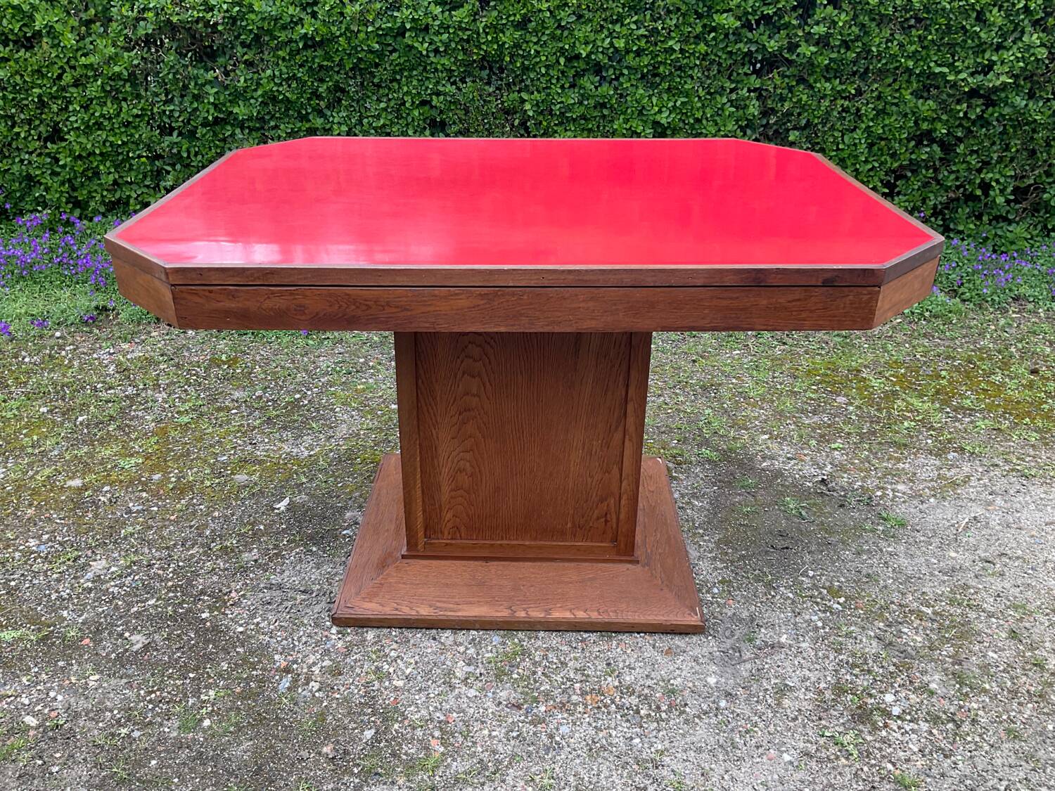 Art Deco dining table in wood and red Formica