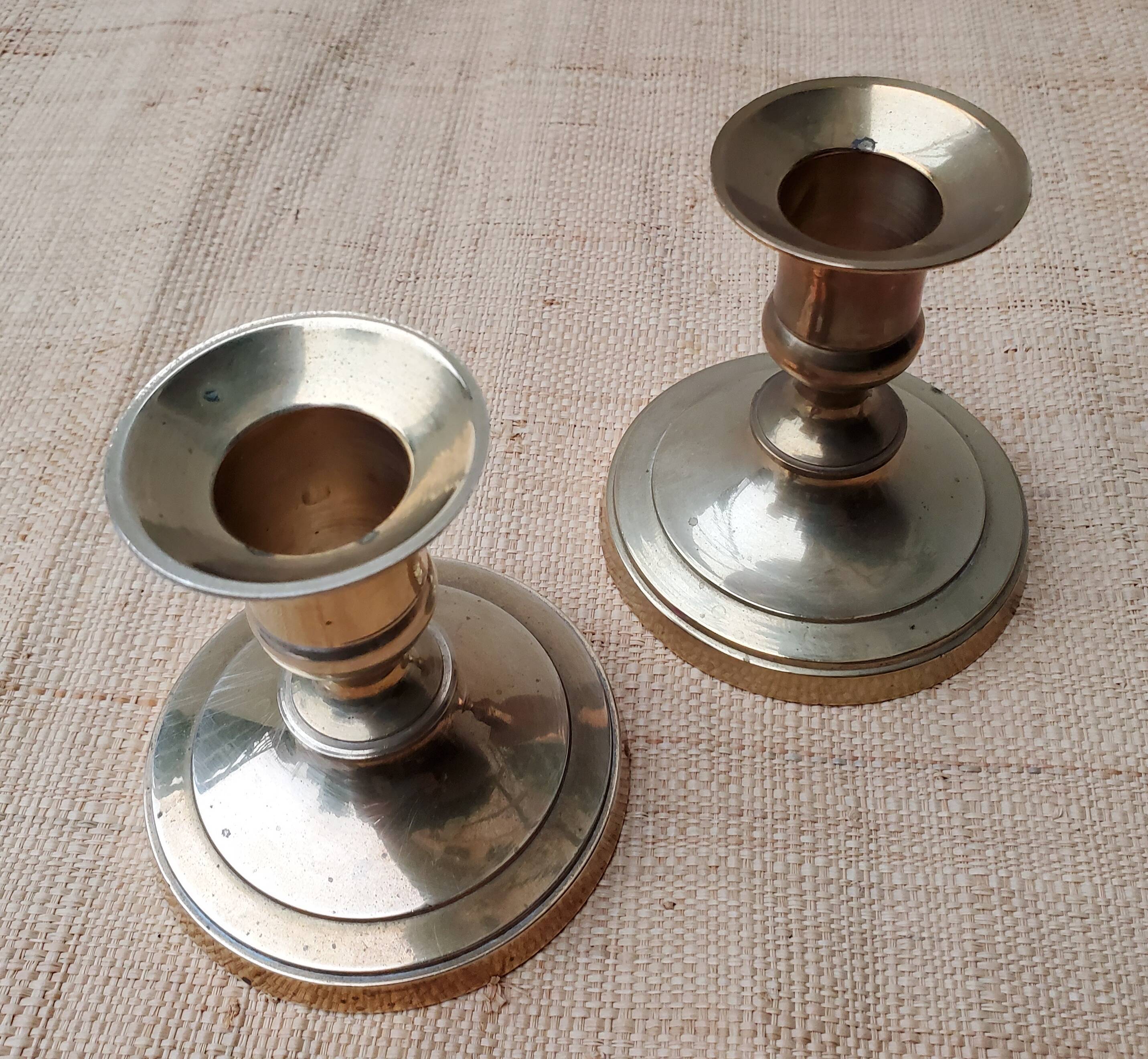 Duo of brass candlesticks