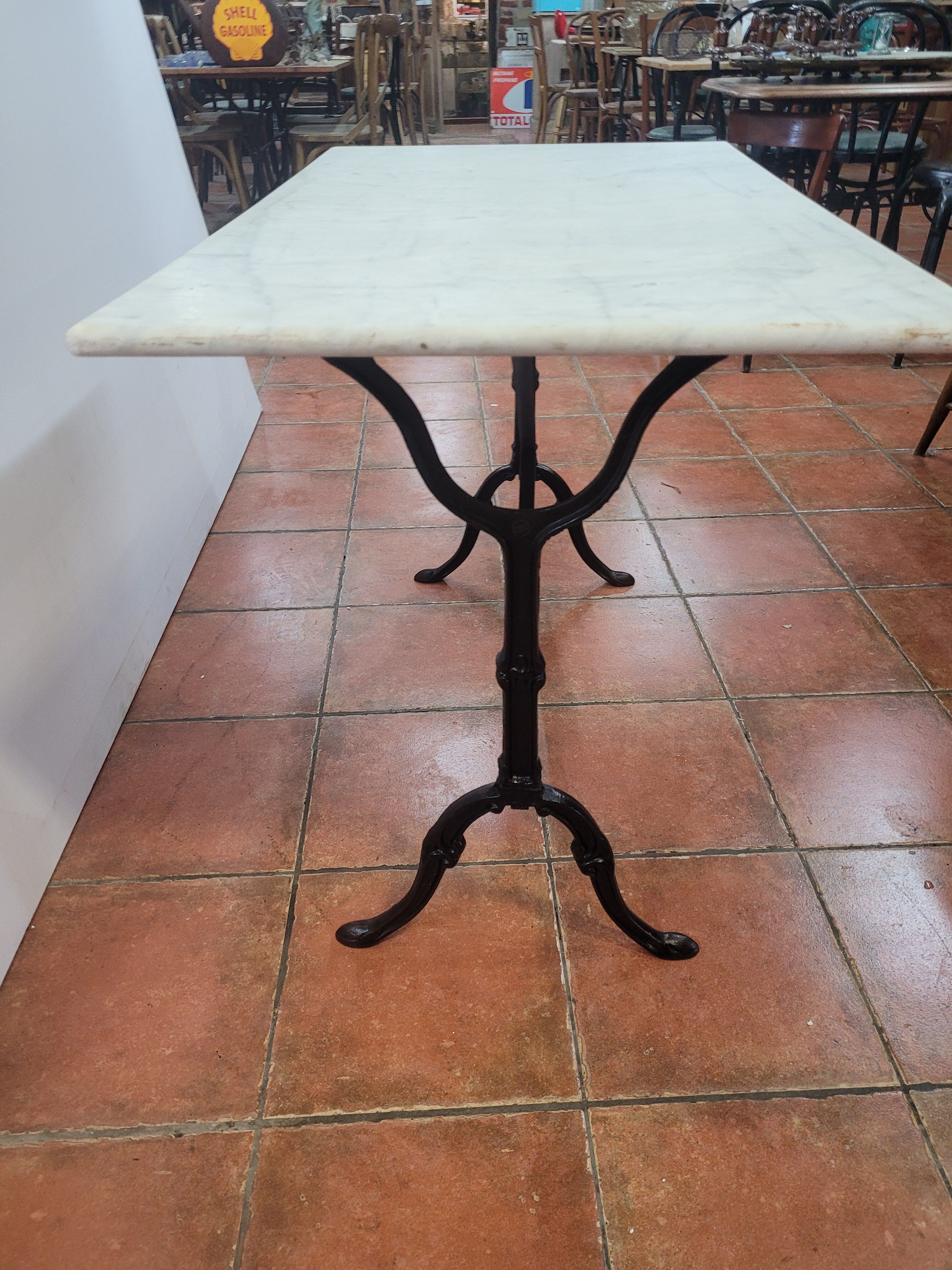 Bistro table base cast iron over marble