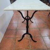 Table de bistrot piètement fonte dessus marbre
