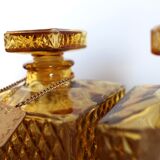 2 yellow glass whiskey carafes