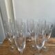 Set of 10 antique champagne glasses in engraved crystal