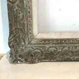 Wooden frame and patinated stucco XX century