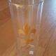 Faceted crystal vase decorated with lily flower