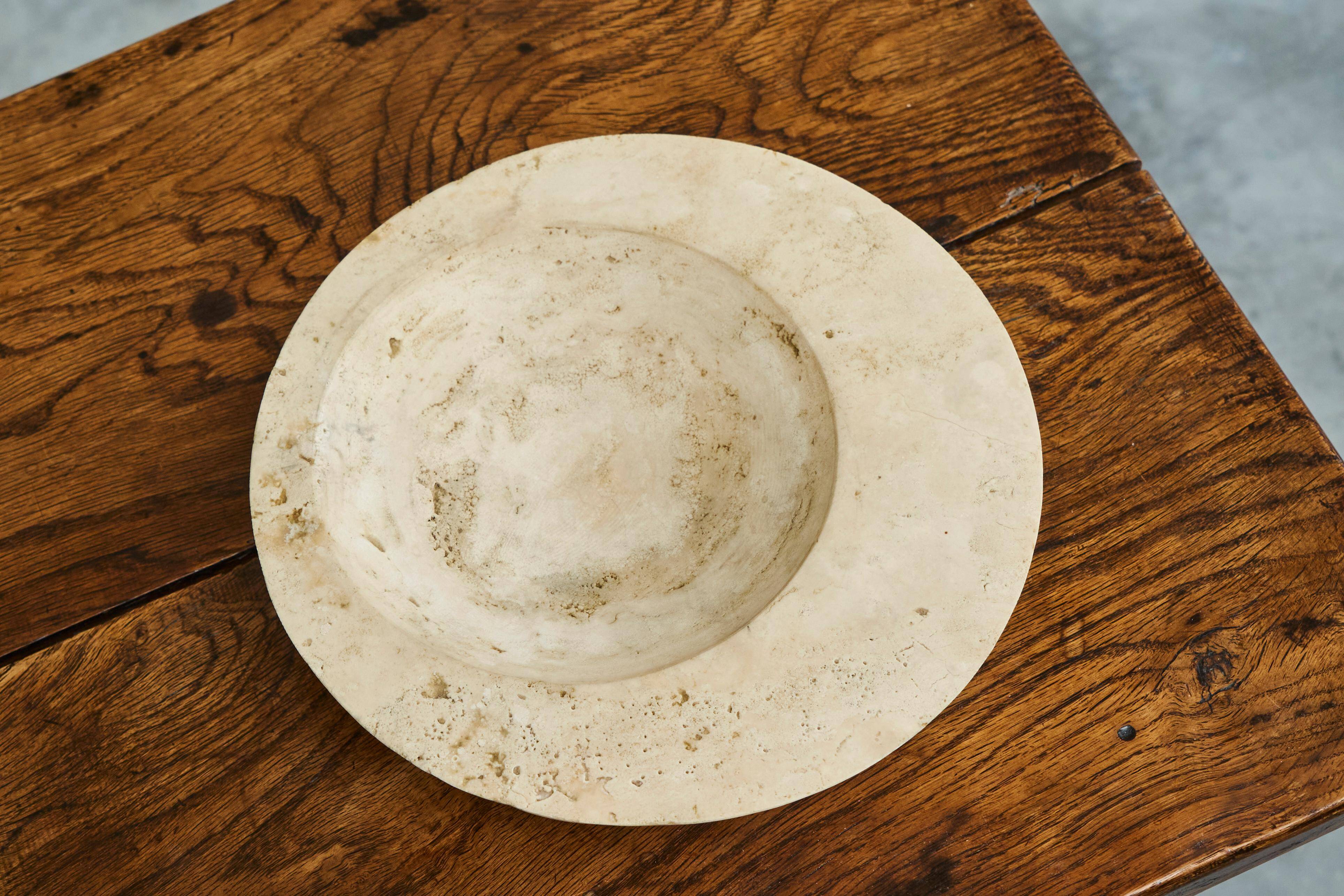 Sculptural cut in travertine